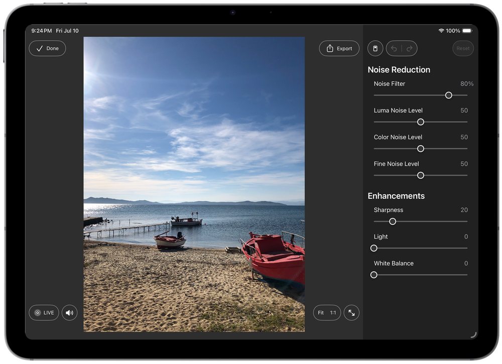 Noiseware on iPad: a Live Photo of boats on a beach open in the editor