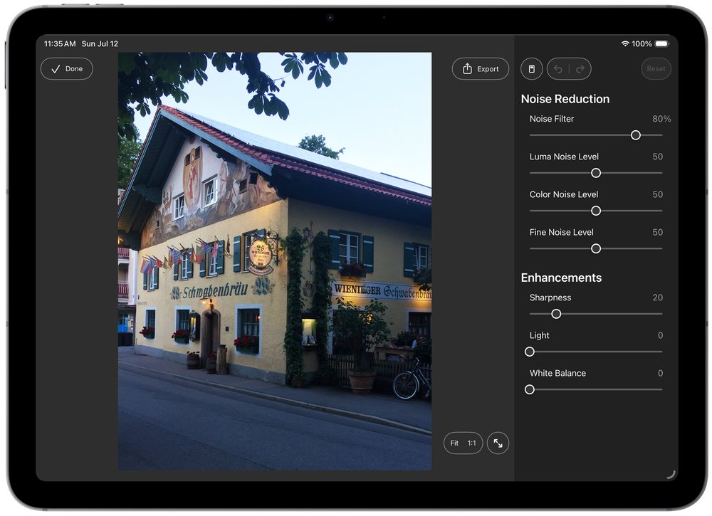 Noiseware on iPad: an evening street scene with the Light and White Balance sliders